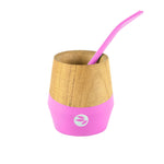 Pink wooden mate cup set with metal bombilla straw for yerba mate tea.