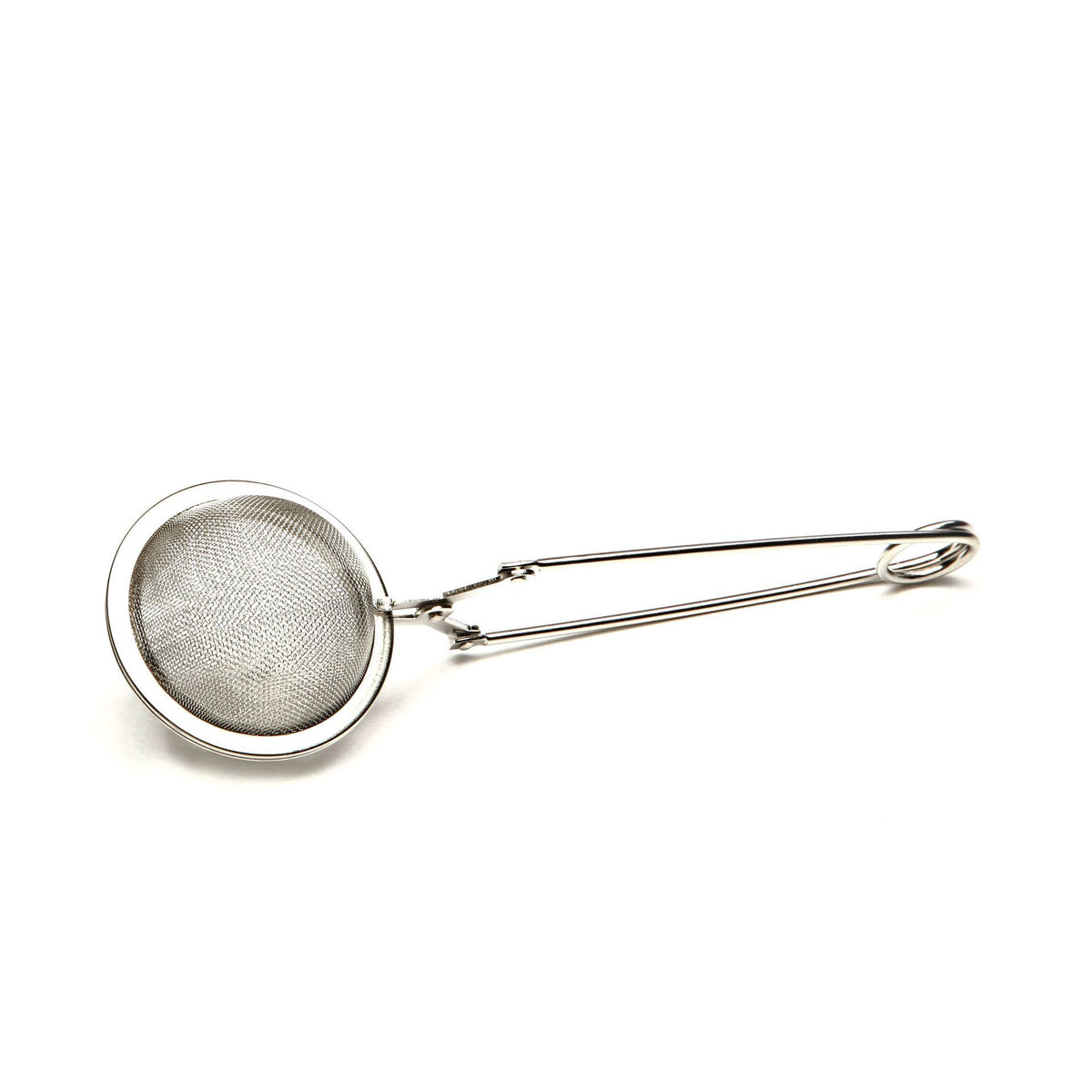 Stainless steel tea infuser for loose leaf tea. Metal tea ball infuser with pliers opening mechanism.Tea infuser brewing loose leaf tea in glass teacup UK. Premium tea strainer ball with fine mesh holes.